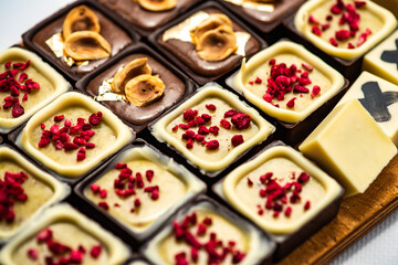 set of chocolate praline isolated on white background, selective focus