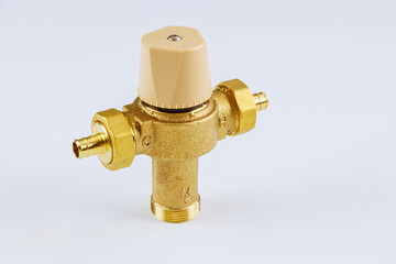 Close up water brass thermostatic mixing valve isolated on white background.