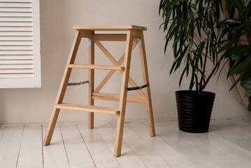 tall white bar stool legs are wood on gray background, Modern designer Bar chair
