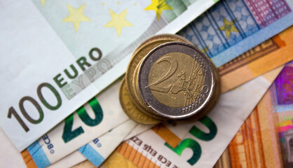 Euro money and various coins close up