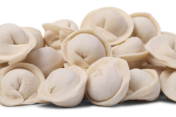 Pile of raw ravioli (or dumplings) isolated on white background. Small depth of focus.