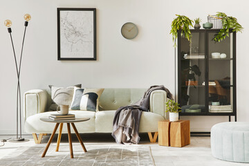 Unique loft interior with green comfortable sofa, design furniture, mock up poster map, carpet,...