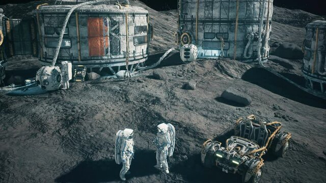 View of the lunar base of the future and the astronauts working in the lunar colony. Animation for sci-fi, futuristic or space backgrounds.