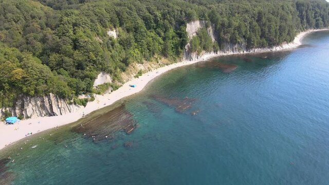 Wild nature of the black sea and green forest with gorgeous mountains in the city of Tuapse