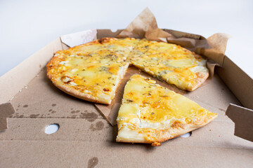 Tasty pizza in carton box. Copy space. Delivery concept.