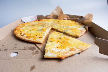 Tasty pizza in carton box. Copy space. Delivery concept.