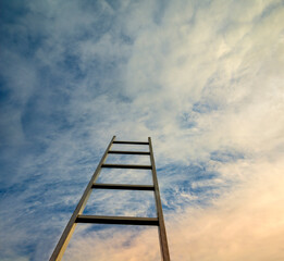 Staircase  against blue sky. Motivation business career growth concept