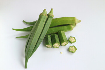 Fresh vegetable okra on white background.