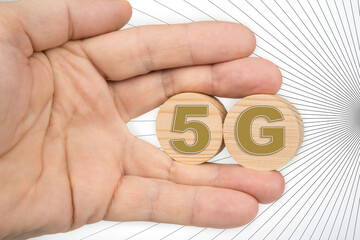 Open hand with  wooden circles 5G network concept