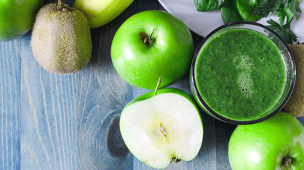 fruit green smoothie in a transparent bowl apples and greens healthy food top view	