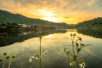 Beautiful of lake view in the morning sunrise, Ban Rak Thai village, landmark and popular for tourists attractions, Mae Hong Son province, Thailand. Travel concept