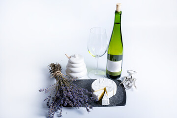 Wine bottle and two wine glasses. Wine bottle against a white background