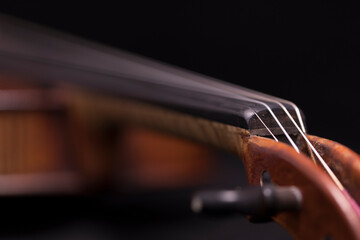 Fototapeta na wymiar A violin on a dark background