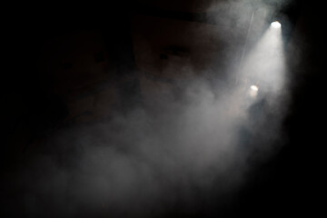 Two stage lights in smoke