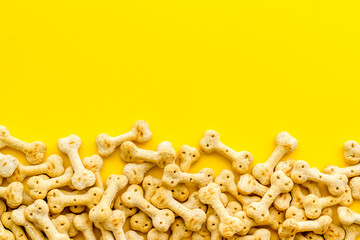 Dry pet dog food background with copy space. Above view