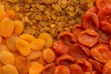 Dried apricots, raisins. Dried fruits as a background.