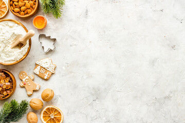 Fototapeta na wymiar Christmas cooking background with gingerbread cookies, overhead view, flat lay