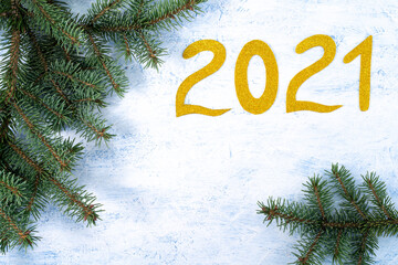 light blue background with fir branches and Golden numbers new year, white