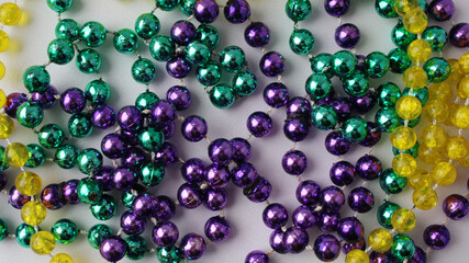 Multicolored small plastic beads, background for design