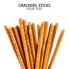 Creative layout made of crackers sticks on the white background. Food concept. Edible snack dry sticks with salt on white background. Straws, sticks crackers.
