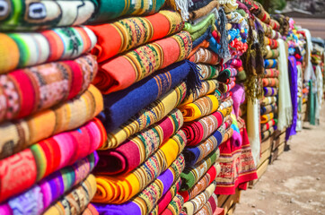 Stock photo of handmade blankets in street market in Purmamarca village , Jujuy, Argentina
