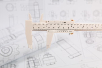 Engineering vernier caliper on paper drawings