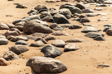 Fototapeta na wymiar Large stones on a beach