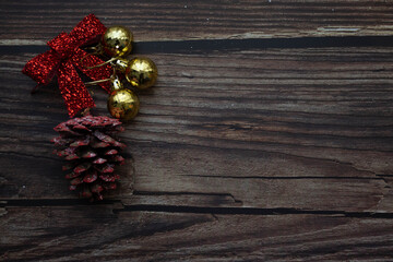 Christmas composition yellow and red decorations on wood background