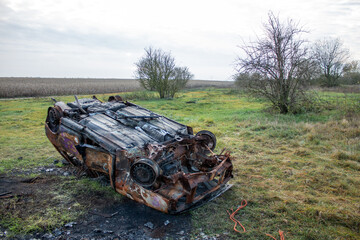 
Car wreck met in the field