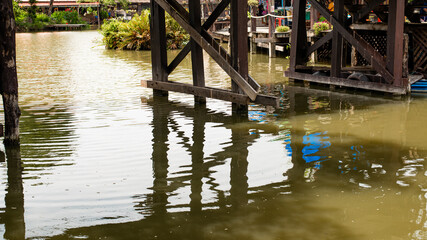 Fototapeta na wymiar Wooden footbridge Are in tourist attractions in Thailand