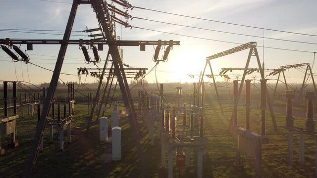 Transformer : The equipment used to raise or lower voltage, high voltage power station. Top view from flying drone

Wide angle, high voltage substation with tall pylons and voltage distribution cables