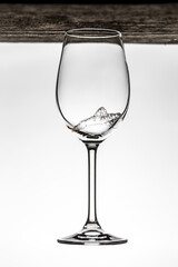Bubbles in a wine glass on a white background