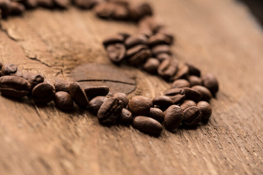 Coffee beans on a wood plank