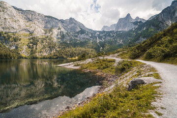 Fototapeta na wymiar Hinterer Gosausee, beautiful lake in the middle of the nature, surrounded by mountains from Dachstein massif, Austrian Alps
