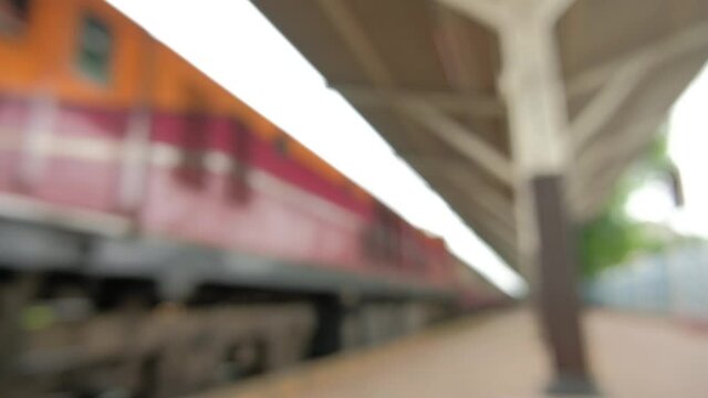 The blur of the train as it passes through the platform