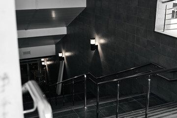 Staircase in the underpass. Top view, metal railing