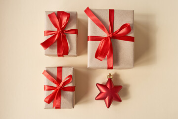 Presents with red ribbon on the bright background .,,