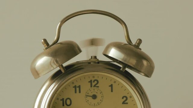 Vintage alarm clock ringing in the morning
