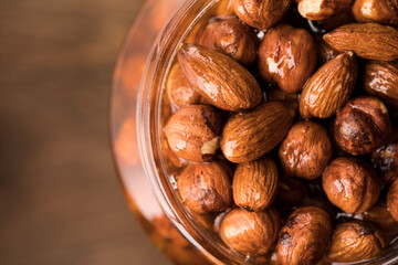 Almonds with honey in a glass jar