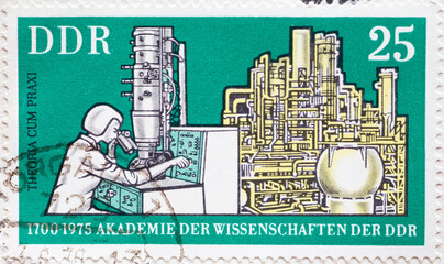 GERMANY, DDR - CIRCA 1975  : a postage stamp from Germany, GDR showing an electron microscope and...