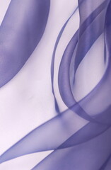 organza fabric texture close up purple violet color. Beautiful abstract wavy fabric background. 