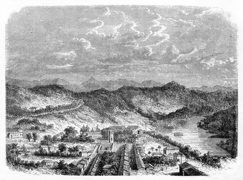 Panoramic top view of Kandy, Sri Lanka, and natural hilled landscape in the distance. Ancient grey tone etching style art by De Bar, Le Tour du Monde, Paris, 1861