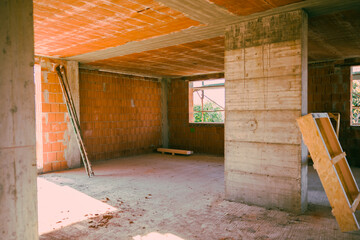 Obraz premium inside of an apartment under construction you can still see the red bricks 
