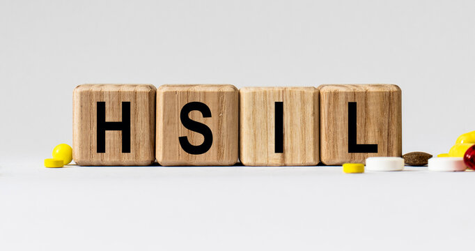 cubes with the word HSIL on them. Care concept.