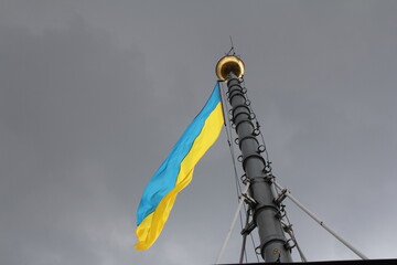Ukrainian flag flying on the mast, yellow and blue