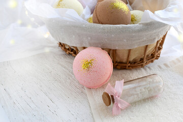 Spa still life  treatment. Composition with bath bombs and sea salt on white background.  Wellness and relax concept.  Natural aromatherapy. Copyspace.