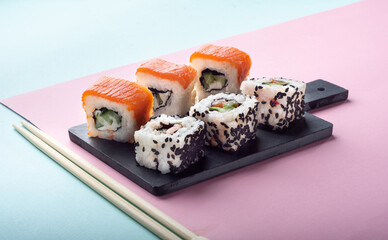 Assorted rolls on a colored background.