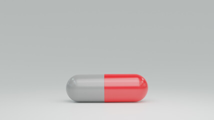 red and white antibiotic medicine pill capsules on table for care health. 3D render Illustration