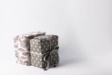 Christmas zero waste, environmentally friendly packaging of gifts in fabrics with natural composition, the concept of an eco-friendly Christmas holiday, minimalism. Christmas new year concept