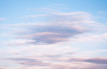 Blue sky and Pinkish clouds.
